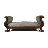 AN IRISH WILLIAM IV CARVED MAHOGANY DAY BED, by Strahan of Dublin, with twin scroll ends,