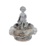 A VICTORIAN LEAD WATER FOUNTAIN BASIN, in the form of a scallop shell with figure perching on the
