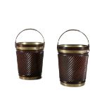 A PAIR OF MAHOGANY AND BRASS BOUND FUEL BUCKETS, in the Georgian style, with rope twist swing