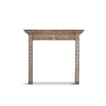 A 19TH CENTURY ADAM'S REVIVAL PINE FIRE SURROUND, the plain top with cavetto edge,