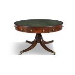 A 19TH CENTURY MAHOGANY DRUM TABLE, of circular form, the top inset with tooled leather scriver,