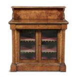 A EARLY VICTORIAN WALNUT AND BRASS MOUNTED SIDE CABINET, of rectangular form, with raised gallery