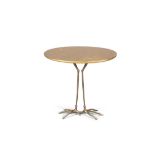 MÉRET OPPENHEIM A Traccia table by Méret Oppenheim, with a gold leaf finish, on solid bronze