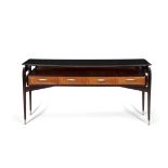 CONSOLE A rosewood console with four drawers, on tapering legs with brass feet and a glass top,