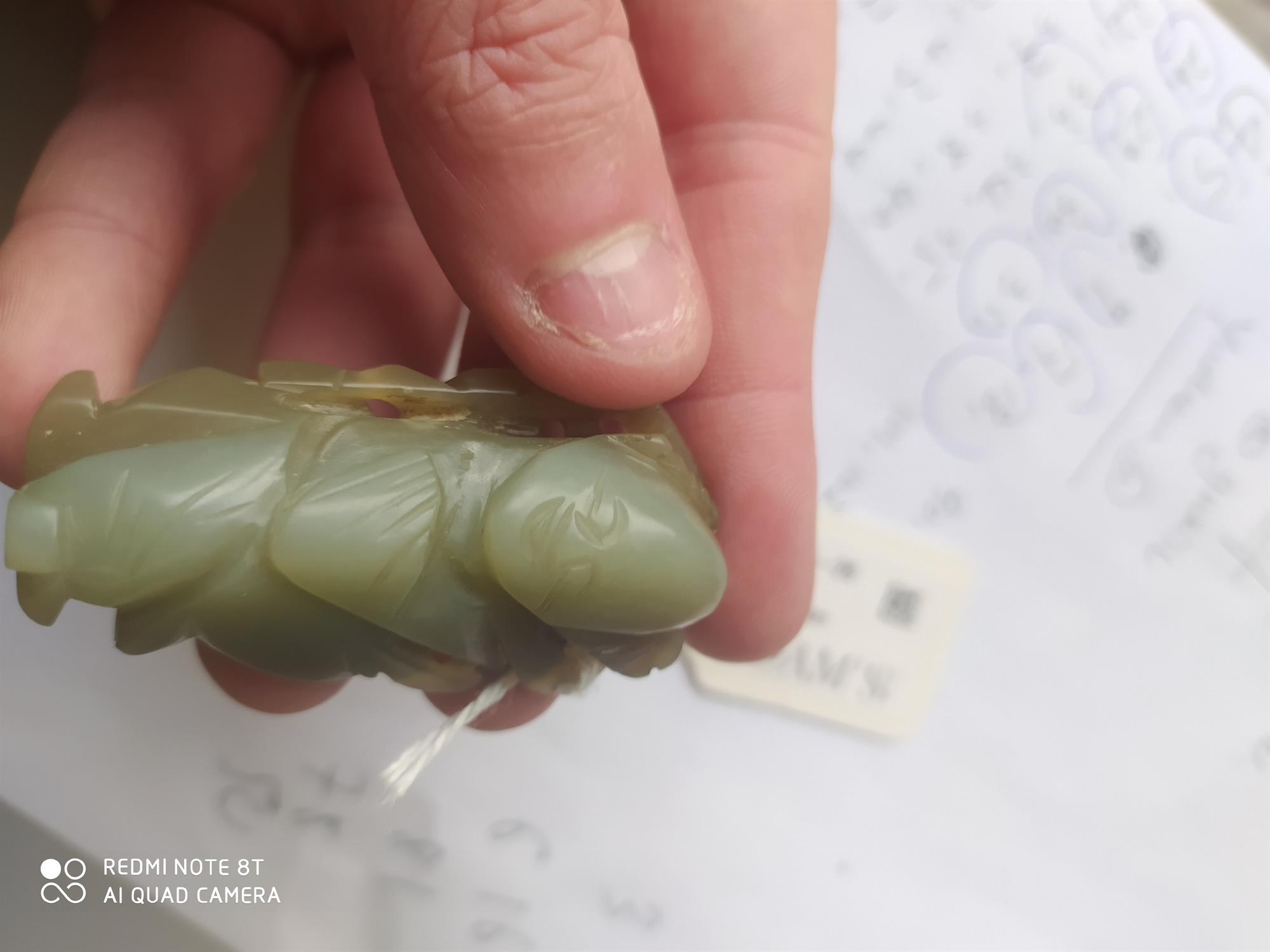 A JADE CARVING OF A BOY WITH A LOTUS SPRIG China, Qing Dynasty, 19th century The boy is holding - Image 7 of 15