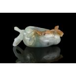 A JADEITE JADE PEACH-SHAPED BRUSH WASHER China, Late Qing Dynasty Carved a peach of longevity