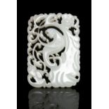 A ‘PARROT, BAT AND PLUM’ OPENWORKED JADE PLAQUE / PENDANT China, Qing Dynasty, 19th