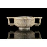 A SMOKEY JADE ‘RICE-GRAIN’ PATTERN TWO-HANDLED CUP China, Attributed to Ming Dynasty,