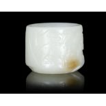 A WHITE AND RUSSET JADE ‘DEER AND PINE’ ARCHER’S THUMB RING China, Qing Dynasty,