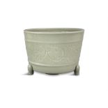 A LARGE LONGQUAN CELADON THREE-LEGGED INCENSE BURNER China, Song to Ming Dynasty Of circular