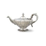 AN IRISH SILVER VICTORIAN TEAPOT, Dublin, c.1844, mark of James Moore, of melon form,