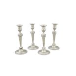 A SUITE OF FOUR SILVER PLATED TABLE CANDLESTICKS, late 19th / early 20th Century,