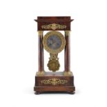 A FRENCH MAHOGANY AND GILTMETAL MOUNTED 'EMPIRE' MANTLE CLOCK, 19th century of architectural form,