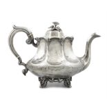 A VICTORIAN SILVER TEAPOT, Sheffield c.1856, mark of Robert & Slater, of squashed lobed form,