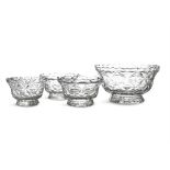 A SUITE OF FOUR FLAT CUT SERVING BOWLS, 19th century, each of circular form, in three sizes,