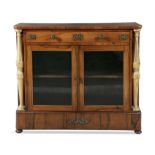 A REGENCY ROSEWOOD COMPACT CABINET, the shaped crossbanded rectangular top, above single frieze