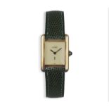 A GOLD PLATED MANUAL WIND 'MUST DE CARTIER' WRISTWATCH, BY CARTIER, the square cream dial black