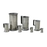 A SET OF SEVEN FRENCH PEWTER MEASURES, of graduated sizes, by Marzo, Passelli, A.Dijon.