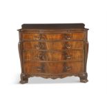 A GEORGIAN STYLE SERPENTINE MAHOGANY CHEST, late 19th Century, the rectangular top with moulded rim,