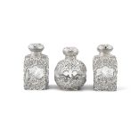 THREE VICTORIAN SILVER OVERLAID AND GLASS PERFUME FLASKS, London, c.1893/1897, with mark of