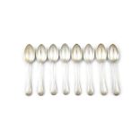 A SET OF EIGHT VICTORIAN SILVER DESSERT SPOONS, Sheffield c.1837, one c.1908, maker's mark of James