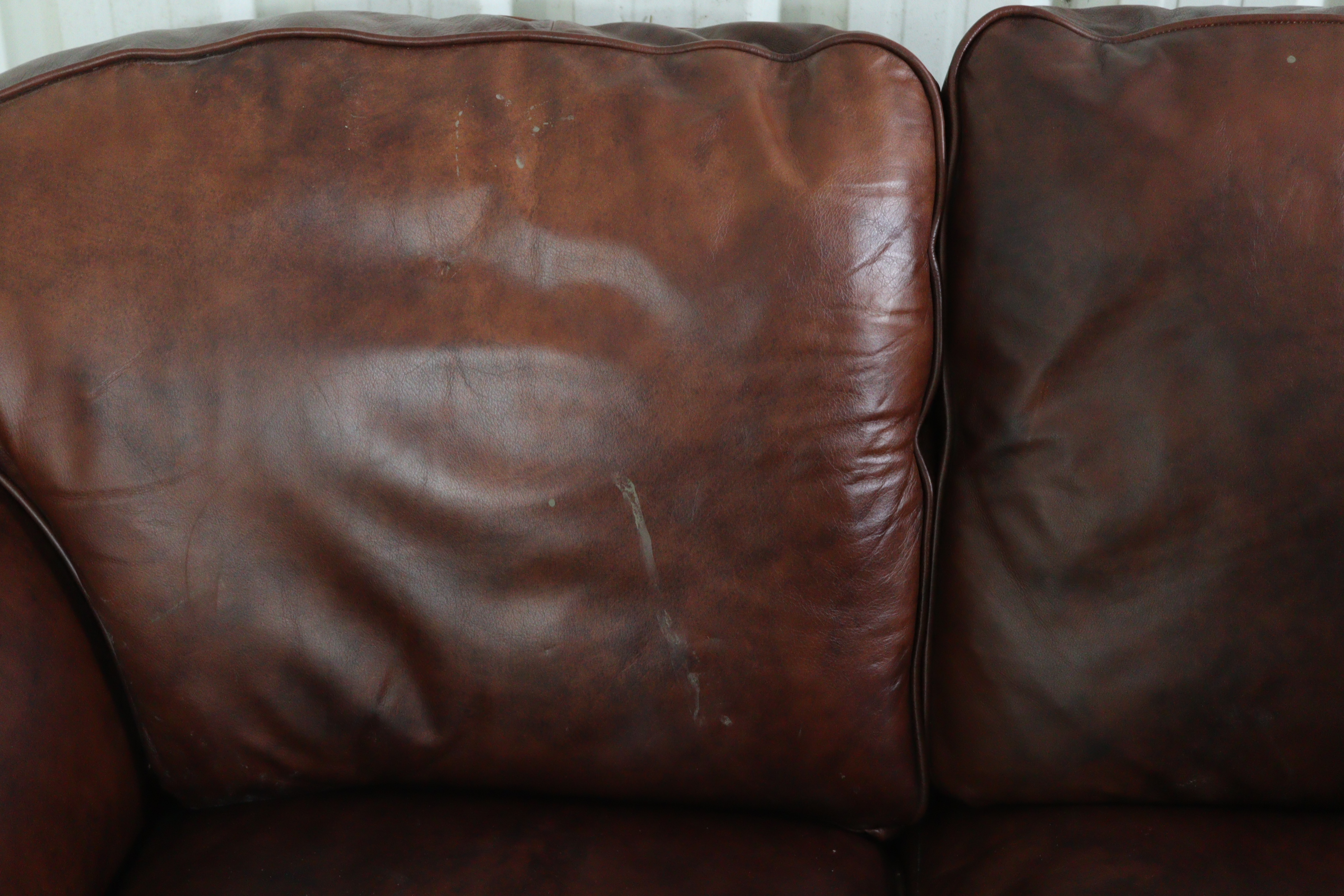 A tan leather three-piece lounge suite comprising of a two-seater settee, 59” long, & a pair of - Image 6 of 10