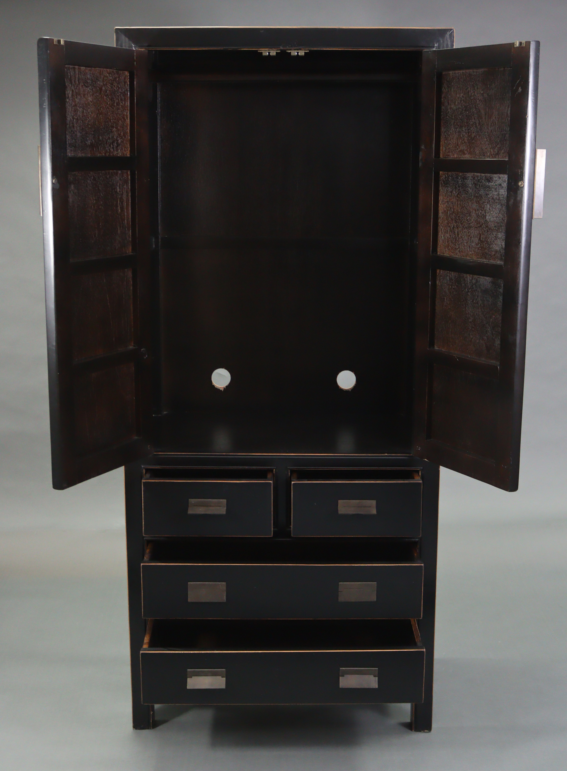 A Chinese style black & gold lacquered wardrobe, enclosed by pair of panel doors above two short & - Image 3 of 7