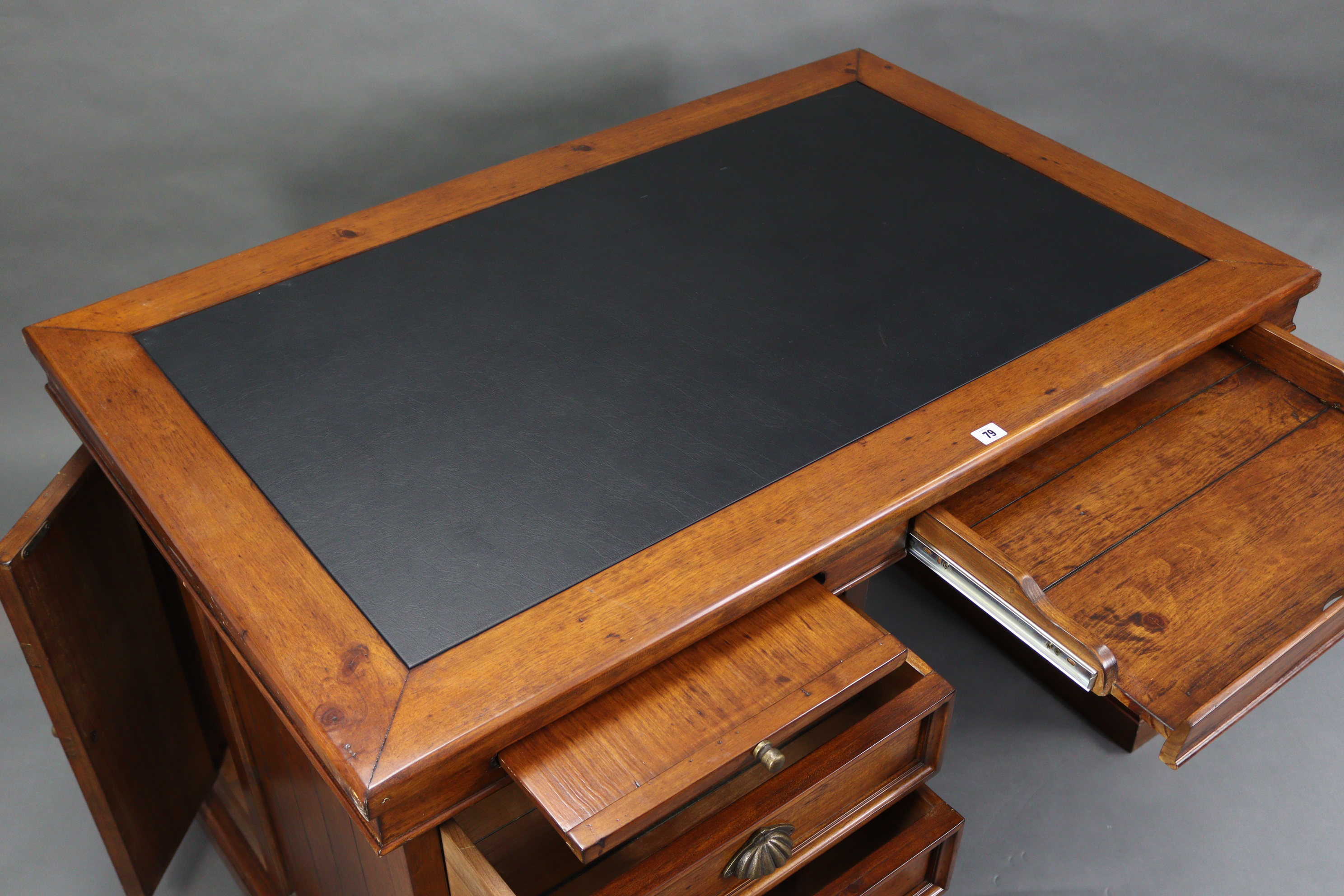 A stained pine office desk, inset black leatherette to the rectangular top, fitted two brushing - Image 4 of 7