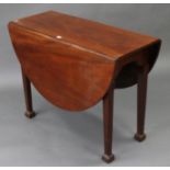 A late 19th/early 20th century mahogany drop-leaf dining table with D-shaped ends, & on square