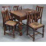 A mid-20th century oak draw-leaf dining table on four bulbous-turned legs, 29½” x 53¼” (open), & a