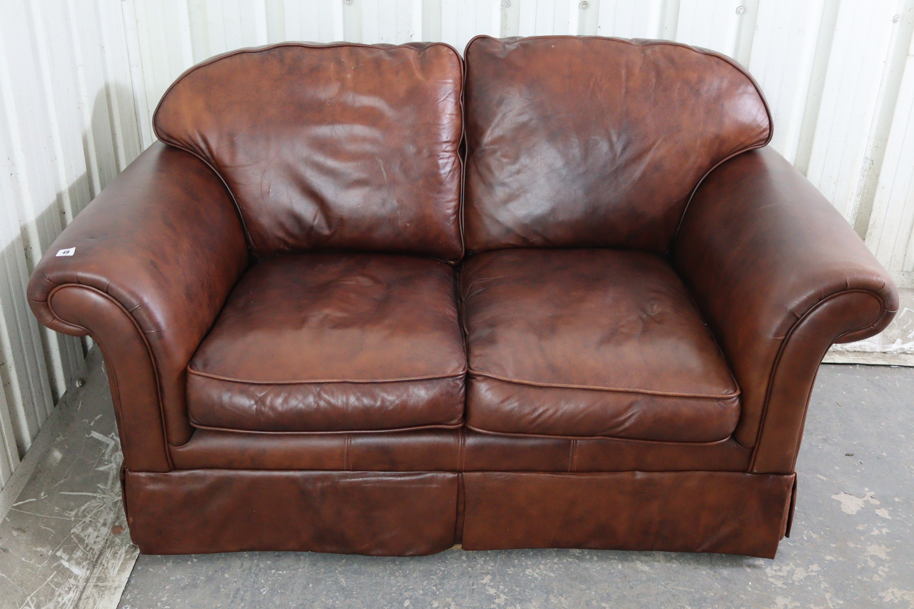 A tan leather three-piece lounge suite comprising of a two-seater settee, 59” long, & a pair of - Image 2 of 10