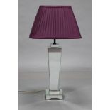 A mirrored table lamp with shade; together with a model sailing boat; various decorative pictures,