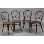 A set of four Emefes bentwood café chairs with circular hard seats, & on round tapered legs (