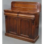 A Victorian mahogany small chiffonier with low-stage panel back, fitted two frieze drawers above