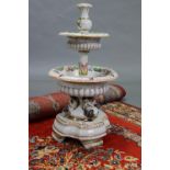 A Capodimonte ceramic circular two-tier centre piece with floral & figure decoration, 21” high;