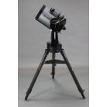 A Celestron “Ultima 2000” computer Automated Telescope, with tripod (w.a.f.).