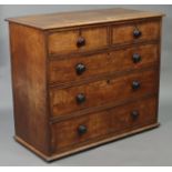 A 19th century oak chest fitted two short & three long graduated drawers with ebonised turned knob