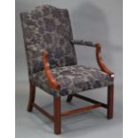 A Georgian-style mahogany frame elbow chair, with shaped back & sprung seat upholstered black & grey