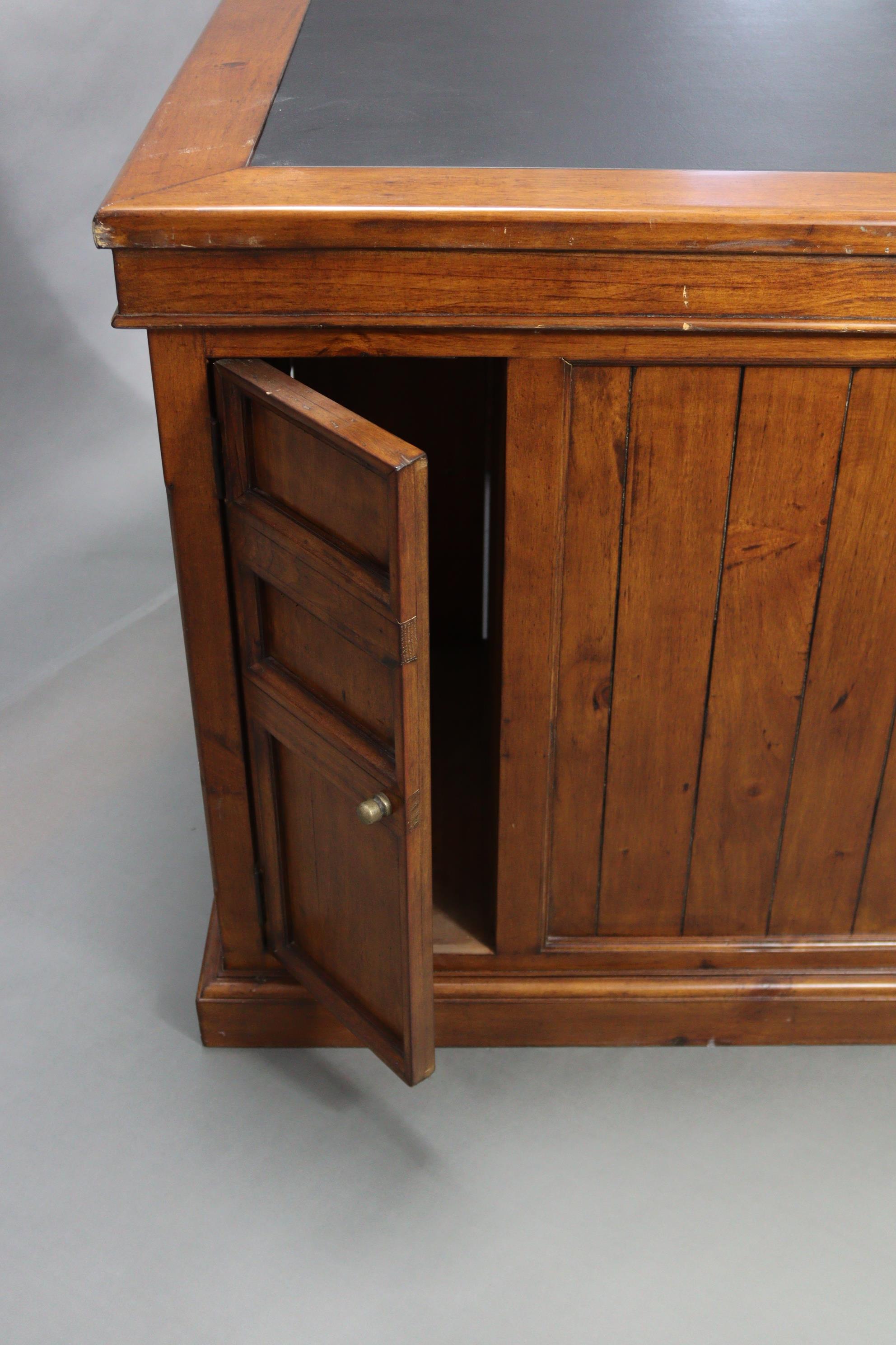 A stained pine office desk, inset black leatherette to the rectangular top, fitted two brushing - Image 5 of 7