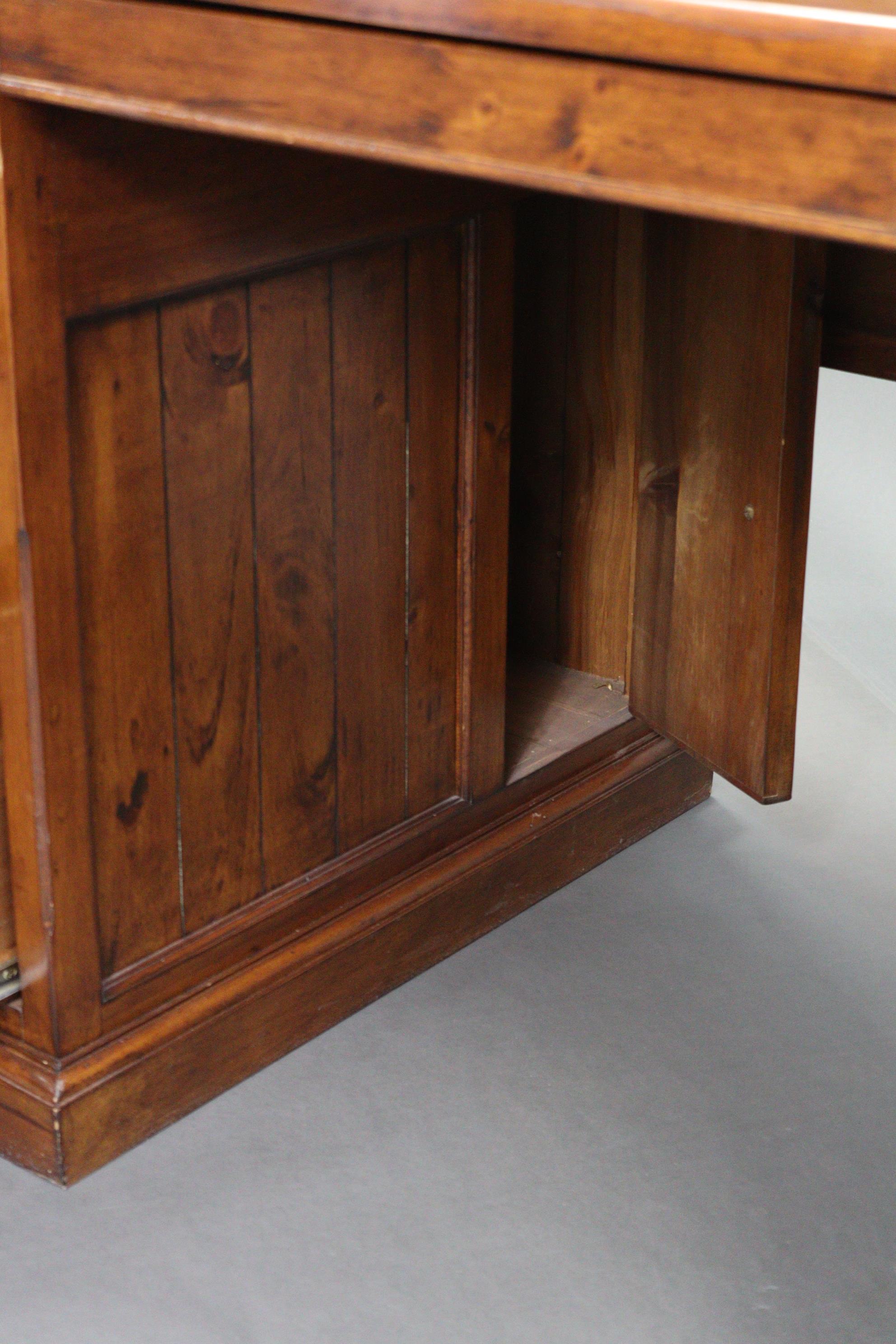 A stained pine office desk, inset black leatherette to the rectangular top, fitted two brushing - Image 7 of 7