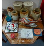 Six various stoneware storage jars; two coloured glass fish ornaments; & sundry other items.