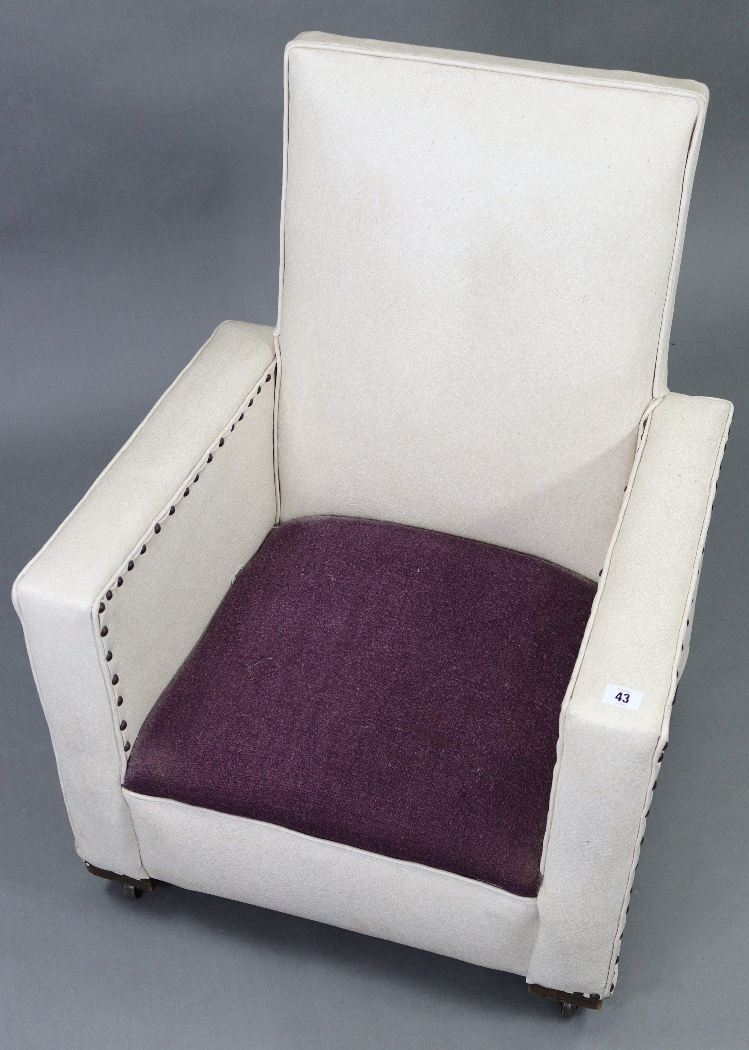 A mid-20th century square-back child’s easy chair upholstered cream rexine, & on castors. - Image 2 of 4