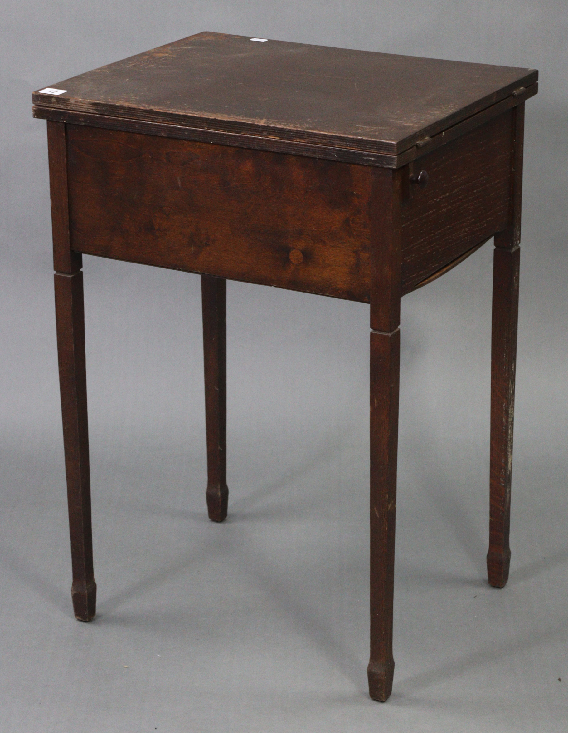 A Singer electric-operated sewing machine, w.o. in oak cabinet on four square tapered legs, “ wide. - Image 7 of 7