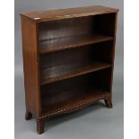 A mahogany small standing open three-tier bookcase, on shaped plinth base, 27” wide x 33” high.