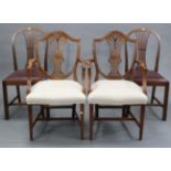 A pair of Georgian style mahogany carver dining chairs, with wheat-sheaf design to the shield