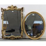 A gilt frame oval wall mirror with egg & dart border & inset bevelled plate, 22½” x 18”, & a gilt