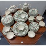 Approximately forty matched items of “Indian Tree” pattern dinnerware.