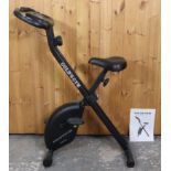 A Gold’s gym “Venice” exercise bike.