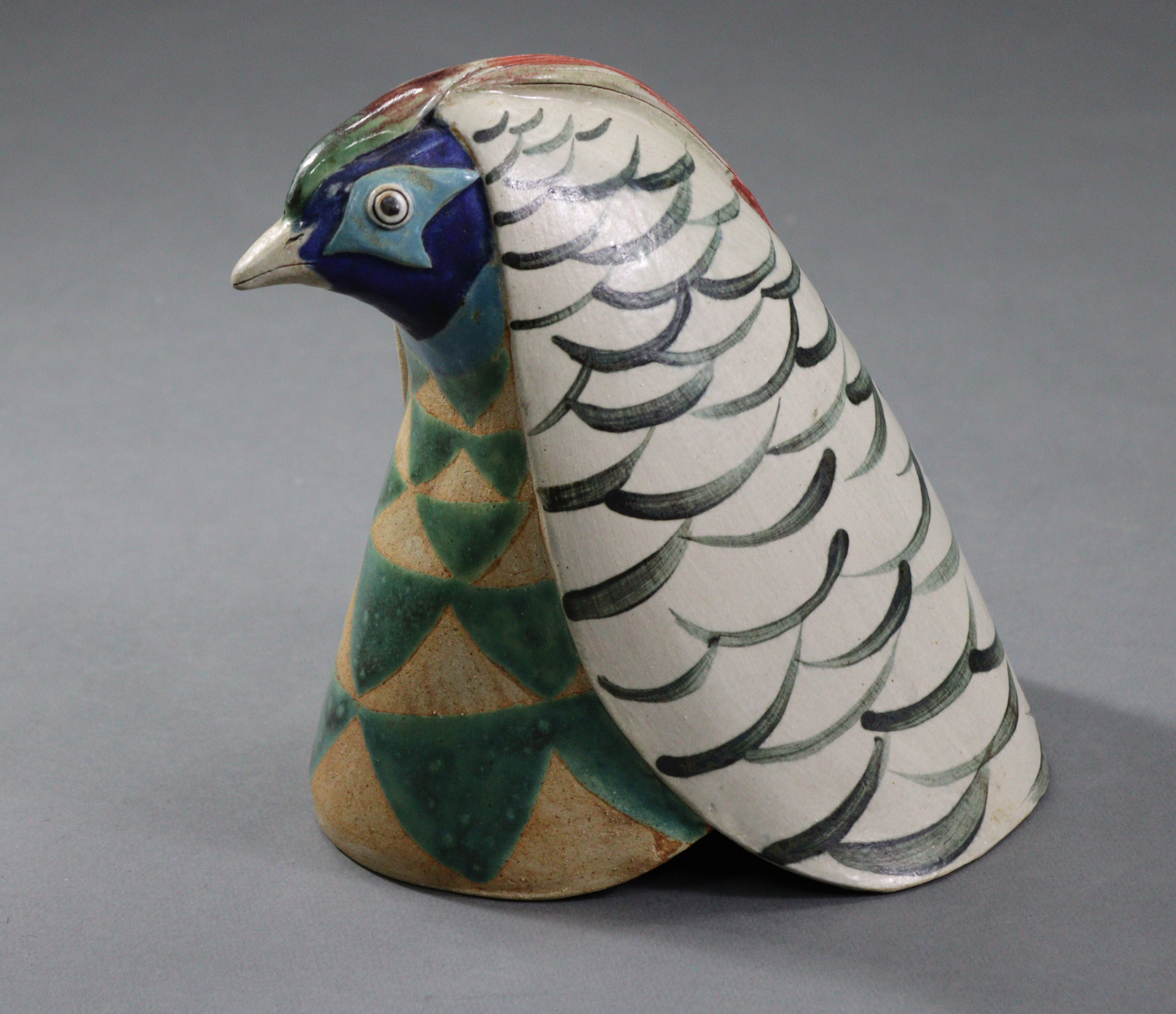 JILL FANSHAW KATO (Contemporary) A ceramic model of a pheasant head with incised & polychrome decora