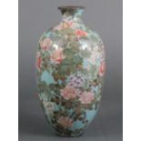 A Japanese cloisonné vase of slender ovoid shape, decorated with wisteria other flowers on a